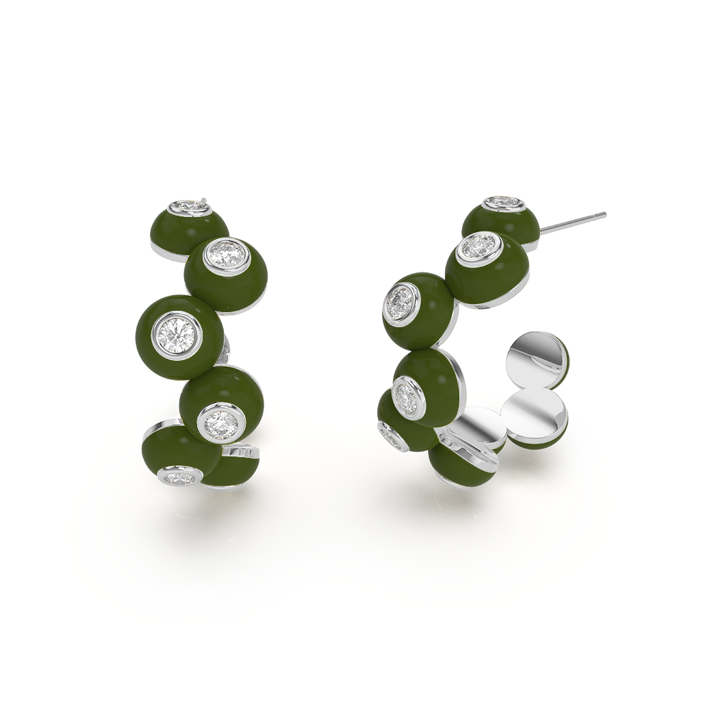 Zig-zag Bauble Earrings: a pair of dangling earrings with a gold zig-zag design and a large, clear bauble.