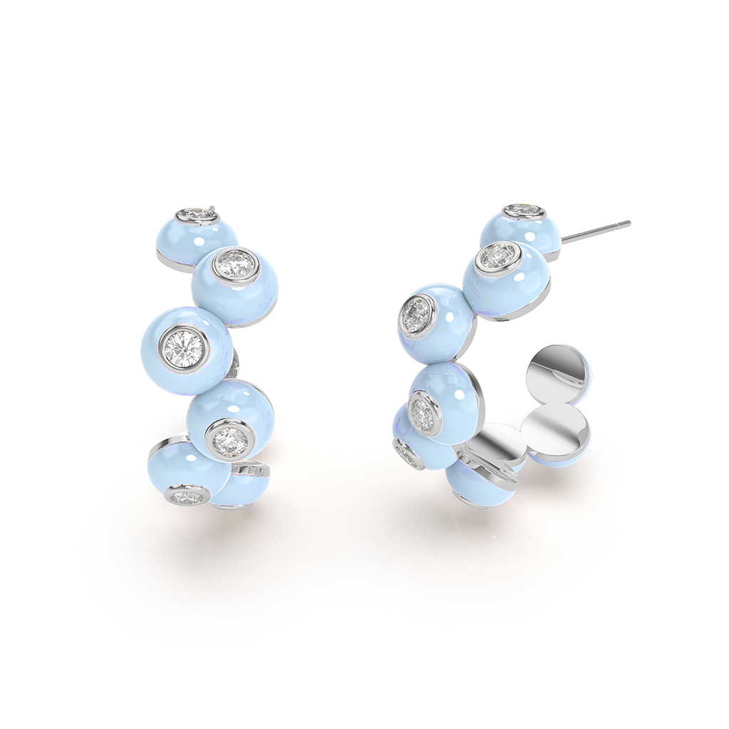 Zig-zag Bauble Earrings, featuring a playful zig-zag pattern on a shiny bauble, dangle from a hook.