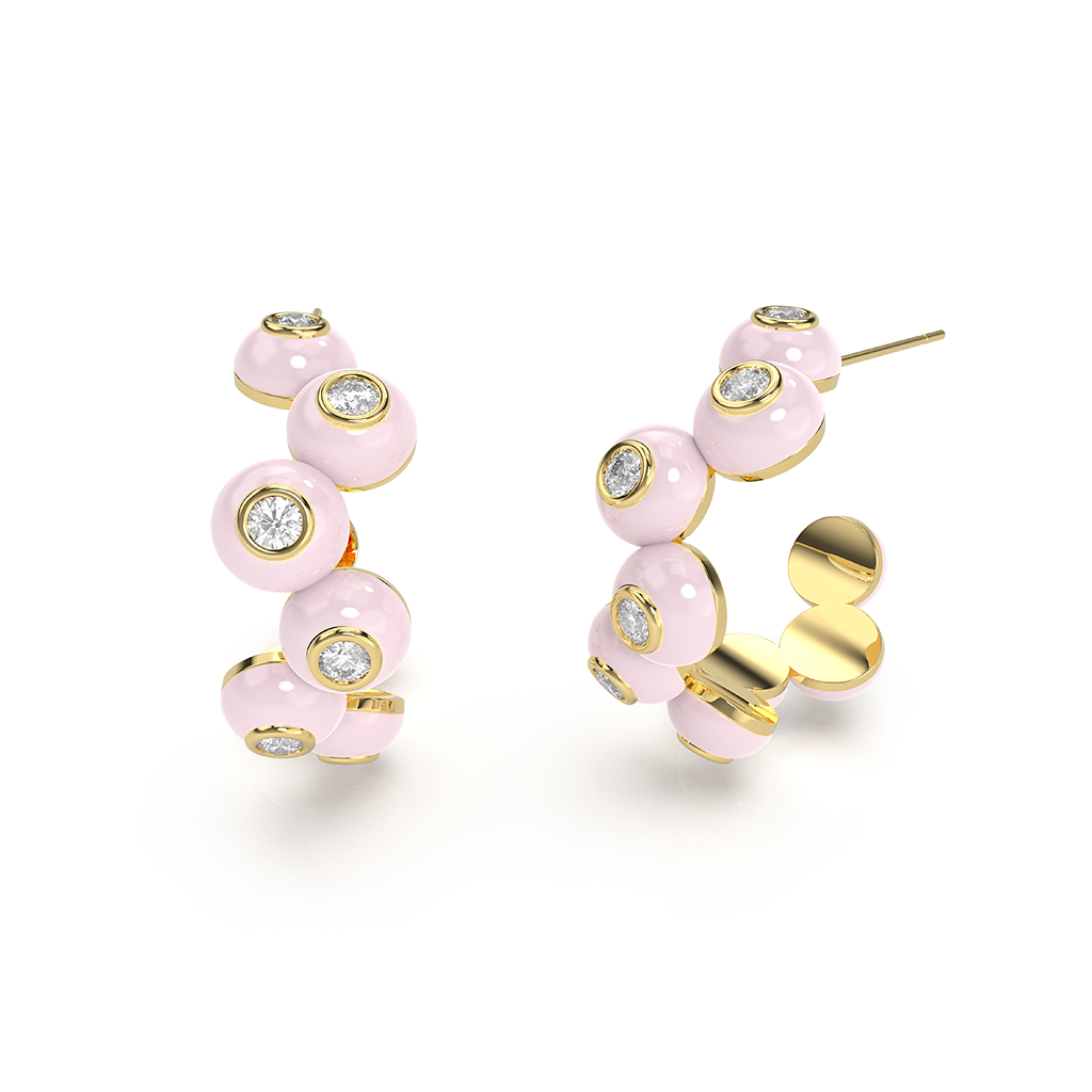 Close-up of sparkling Zig-zag Bauble Earrings, featuring a gold metal zig-zag design with a dangling pearl bauble.