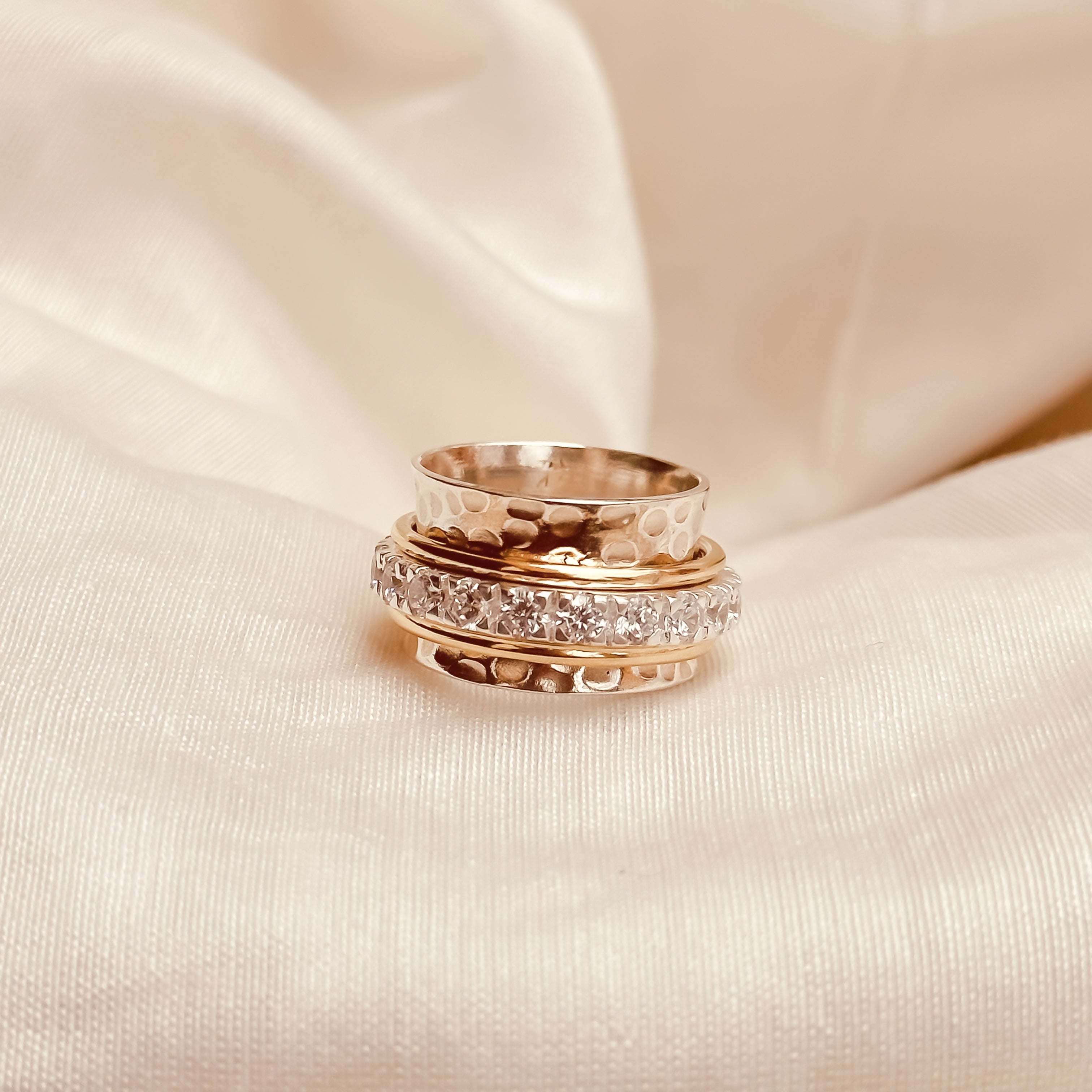 May Birthstone Eternity Spinner Ring - Octonov