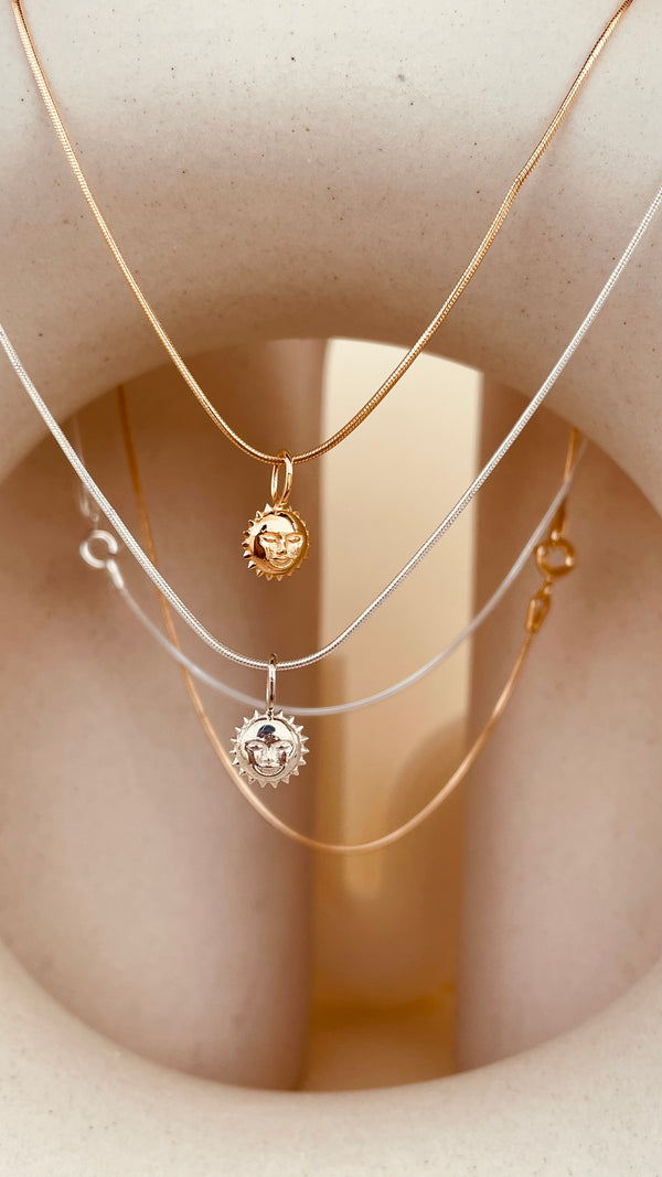 Steller Sun Charm Necklace with Snake Chain