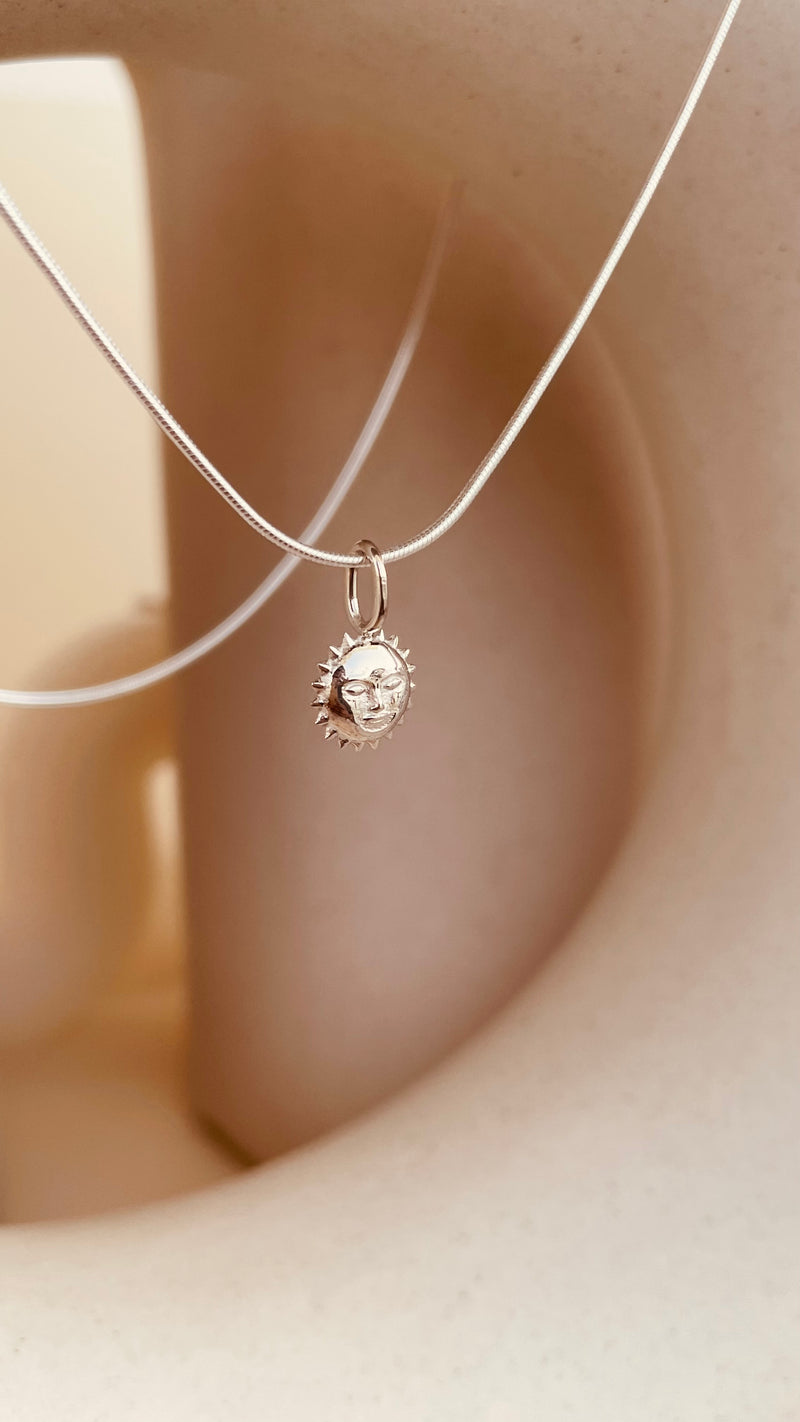 Steller Sun Charm Necklace with Snake Chain